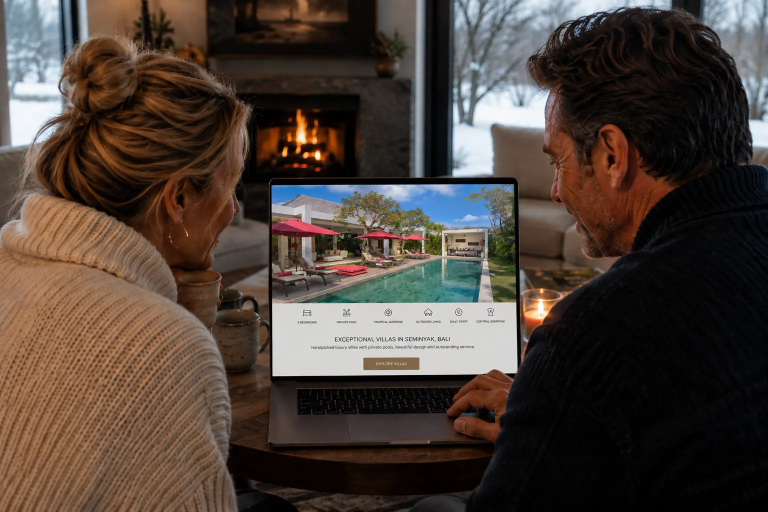 A couple at a laptop reading a villa-rental listing headed “Exceptional villas in Seminyak, Bali”, a pool and claret parasols on the screen