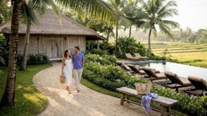 Couple walking through Bali villa garden